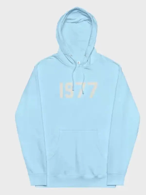 Front view of the 1977 Essentials Hoodie light blue pullover with the light numerical '1977' logo across the chest.
