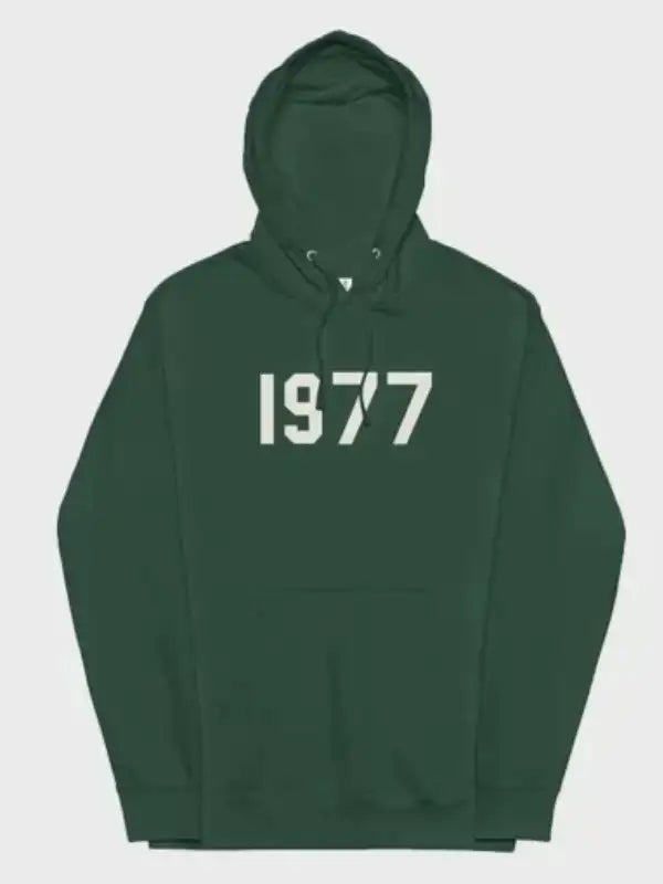Front view of the 1977 essentials hoodie green pullover with the white '1977' logo across the chest.