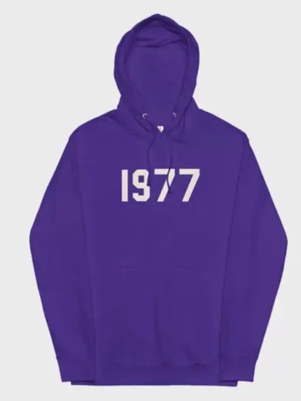 Front view of the 1977 essentials hoodie purple pullover with the white '1977' logo across the chest.