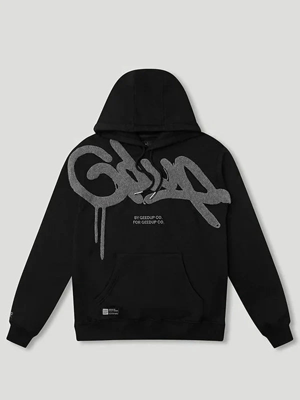 Front view of black Geedup Co. hoodie with large grey graffiti logo and drip effect.