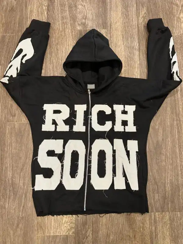 Front view of a black full zip hoodie