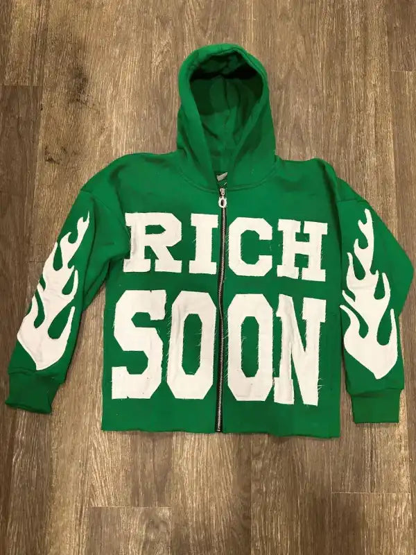 Front view of a green full zip hoodie