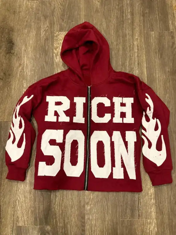 Front view of a red full zip hoodie
