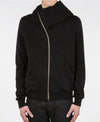 Front view of a black full zip hoodie featuring a distinctive asymmetrical zipper