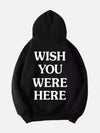 Black Astroworld pullover hoodie  text on the back 'WISH YOU WERE HERE'.