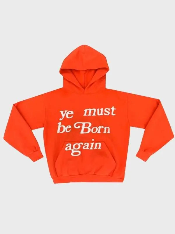 Orange hoodie with white text "Ye Must Be Born Again Hoodie" on a light gray background